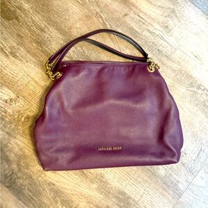 Beautiful, maroon colored leather Michael Kors bag